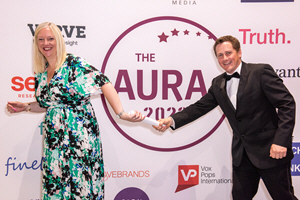 Tim Steere passing on the AURA 'baton' to Ruth Hinton at the AURA Awards event held on 20th July 2023 at the Kia Oval