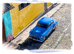 Cobbled street and car, Cuba