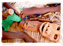 Mask carver, Mozambique