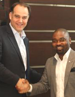 Pedro Ros, CEO of TNS and Adeola Tejumola CEO of RMS clinch the deal